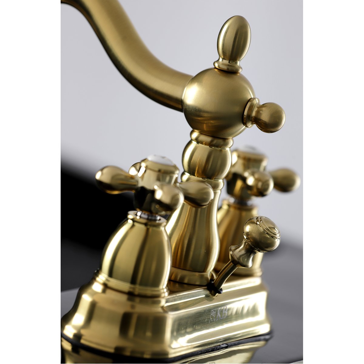 Kingston Brass Heritage Deck Mount 4-Inch Centerset Bathroom Faucet