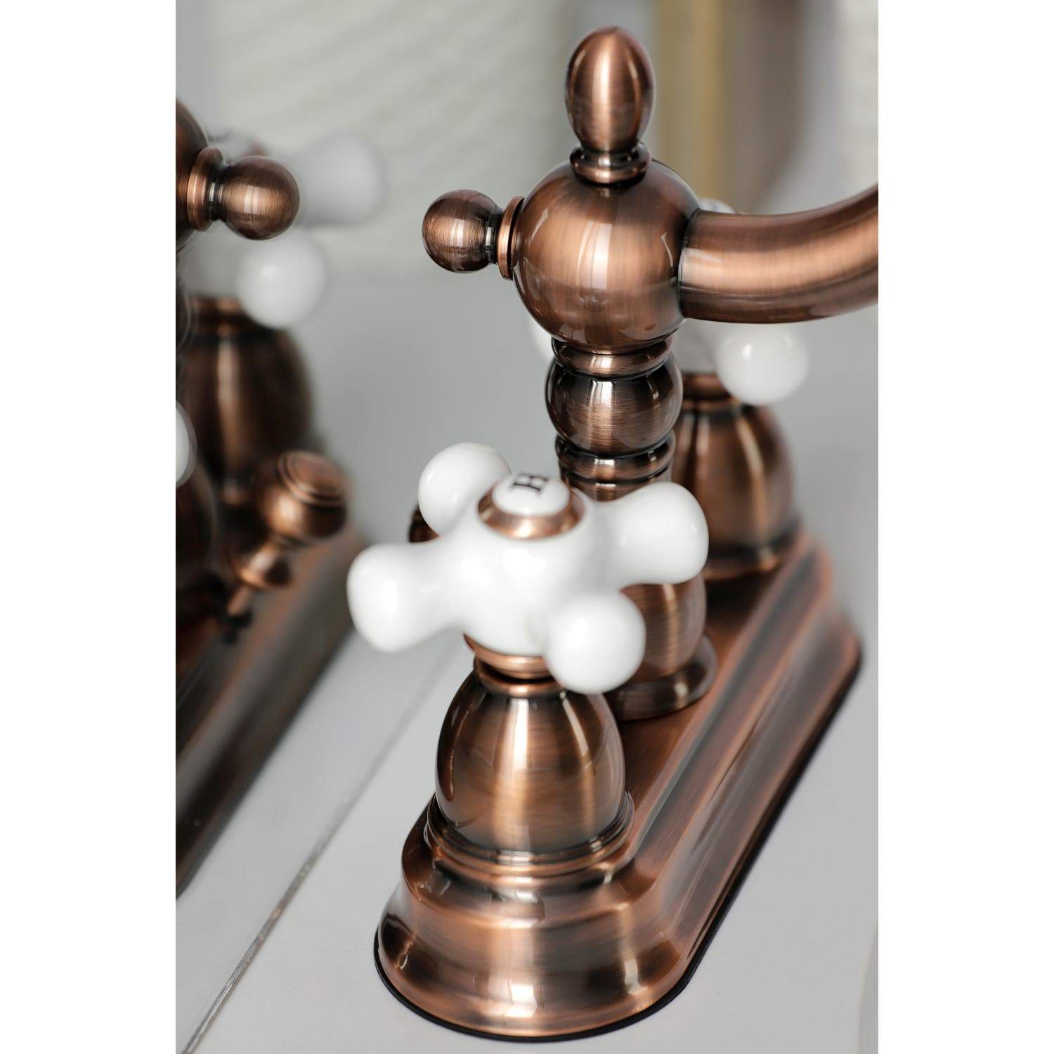 Kingston Brass KB160PXAC Heritage 4 in. Centerset Bathroom Faucet, Antique Copper