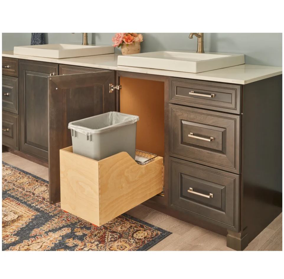 Single 35 Quart Wood Bottom-Mount Soft-close Trashcan Rollout for Hinged Doors, Includes Grey Can in bathroom setting