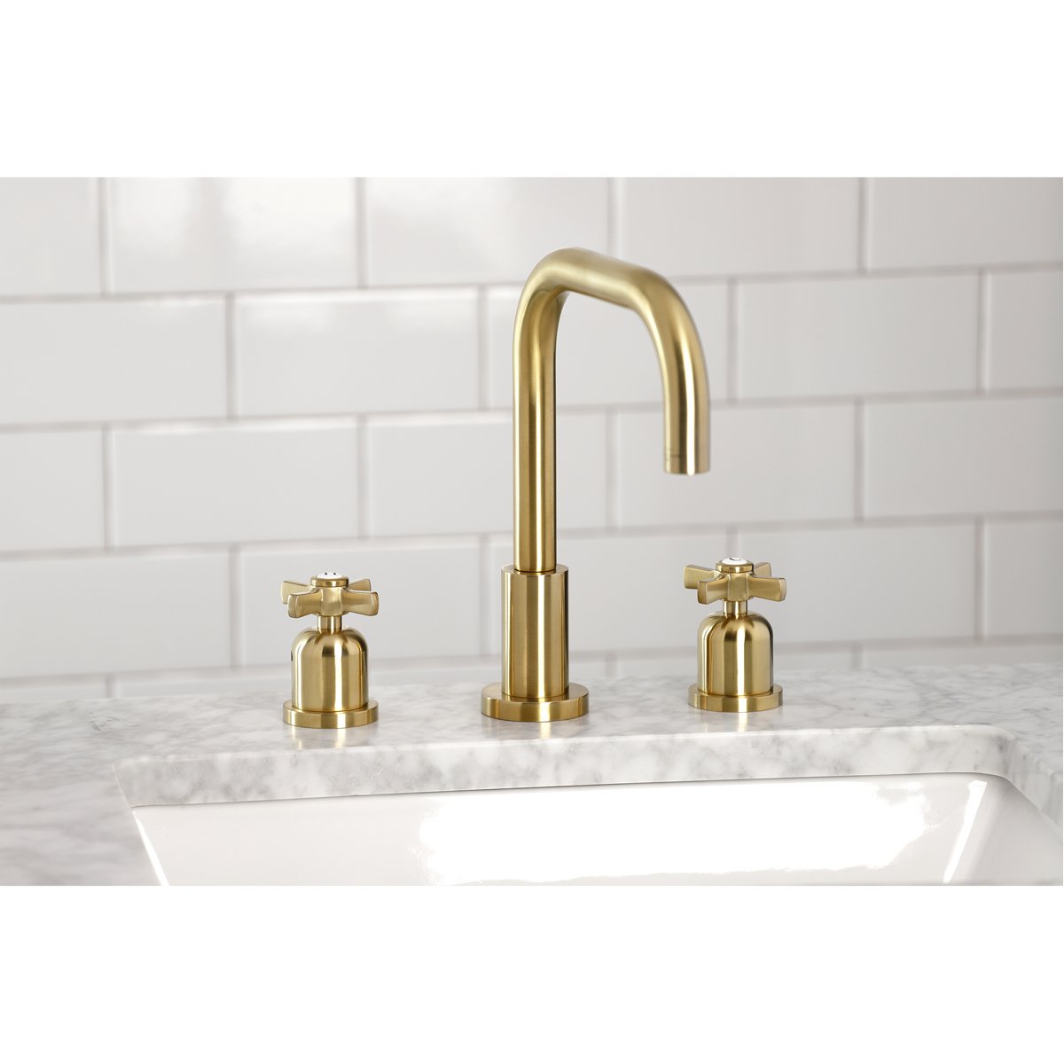 Kingston Brass Millennium Widespread Bathroom Faucet with Brass Pop-Up