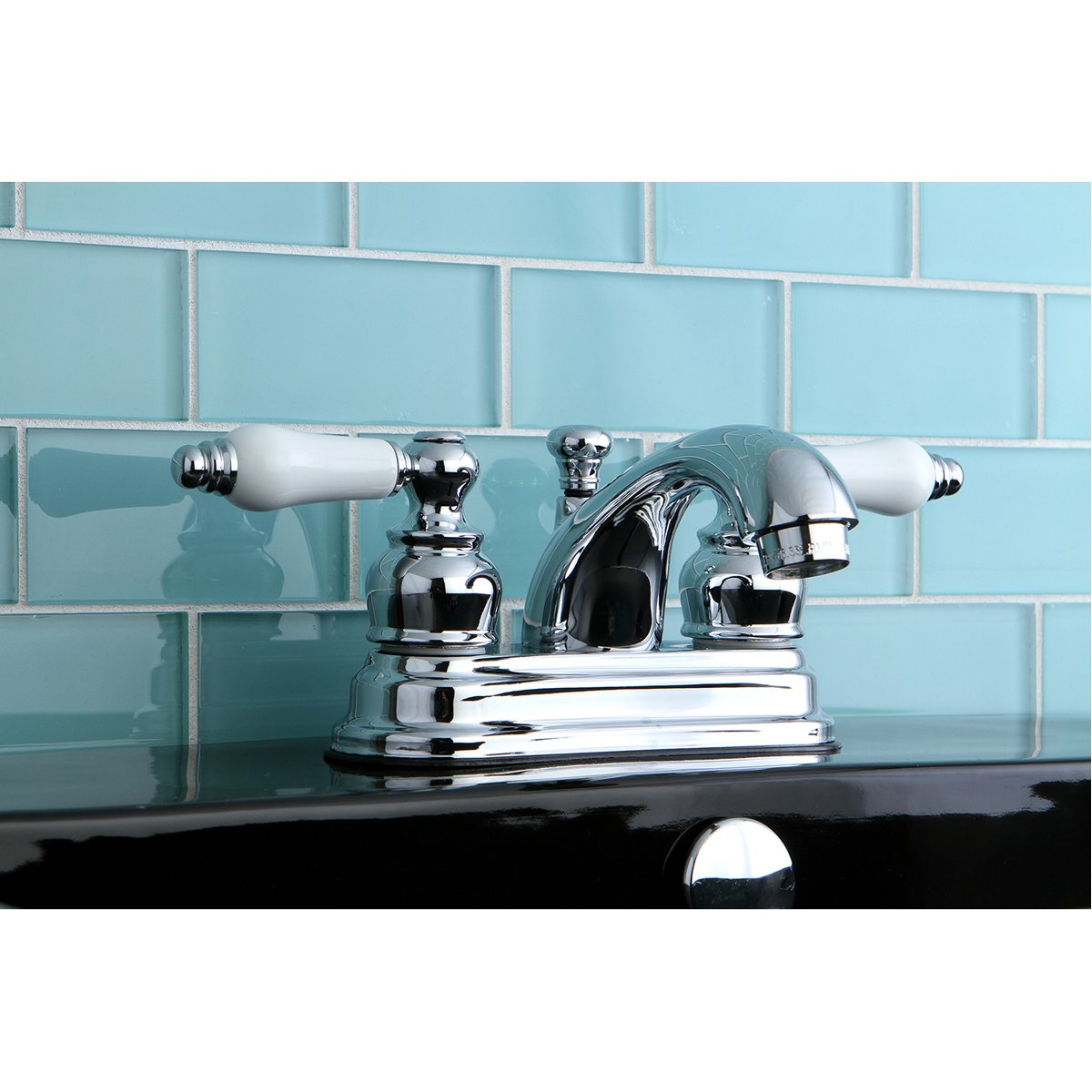 Kingston Brass 4-Inch Centerset Bathroom Faucet with Pop-Up Drain