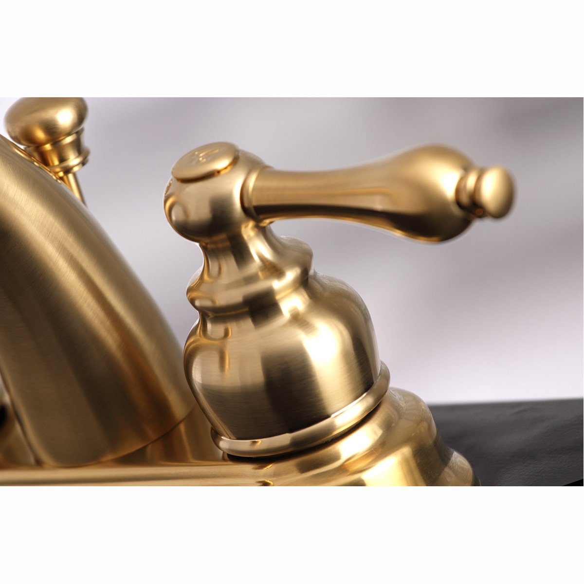 Kingston Brass Restoration 4-Inch Centerset Bathroom Faucet