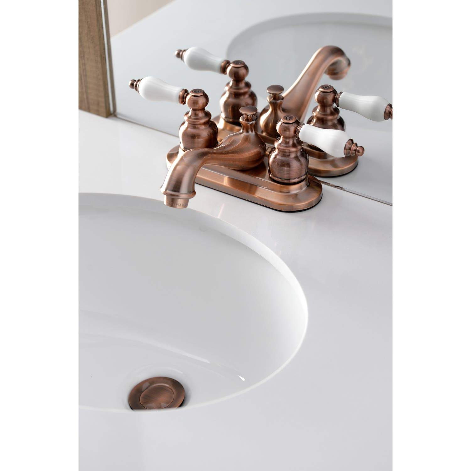 Kingston Brass KB606PL Restoration 4 in. Centerset Bathroom Faucet, Antique Copper