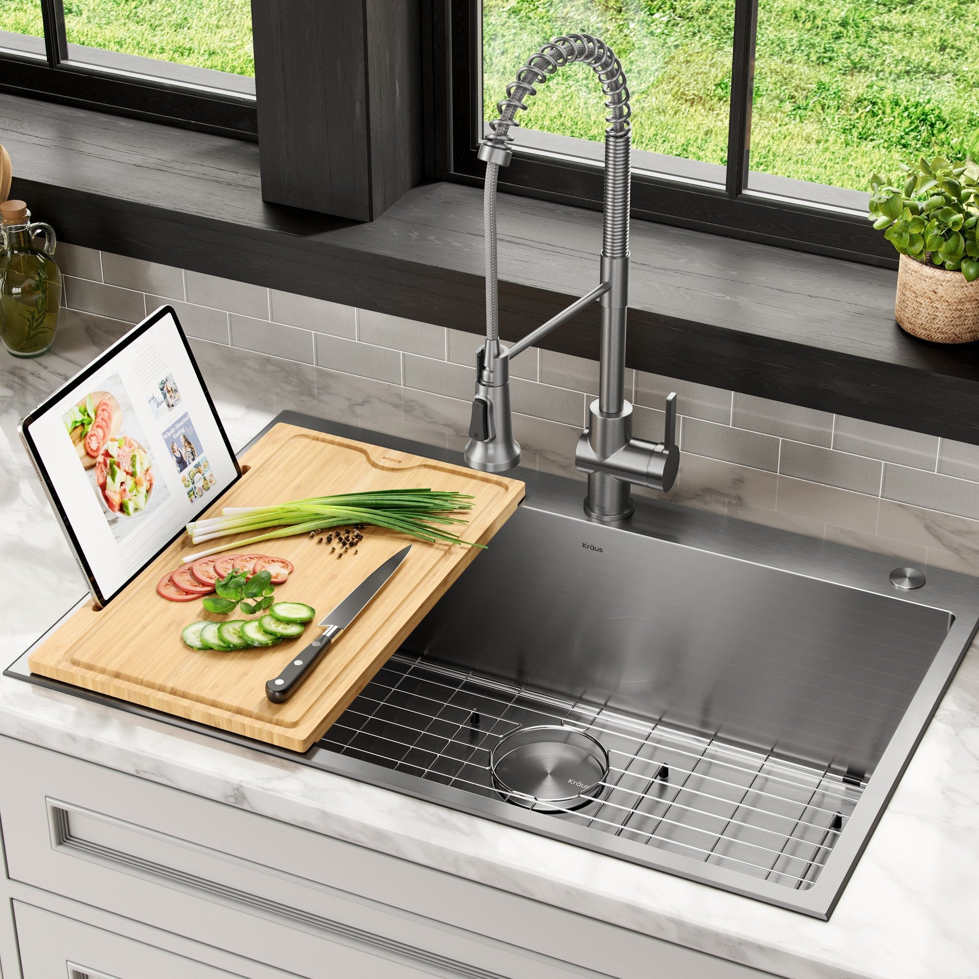 https://directsinks.com/cdn/shop/products/KRAUS-Solid-Bamboo-Cutting-Board-with-Mobile-Device-Holder-for-most-Standard-Kitchen-Sinks-KRAUS-DirectSinks-4_2000x2000.jpg?v=1654325474