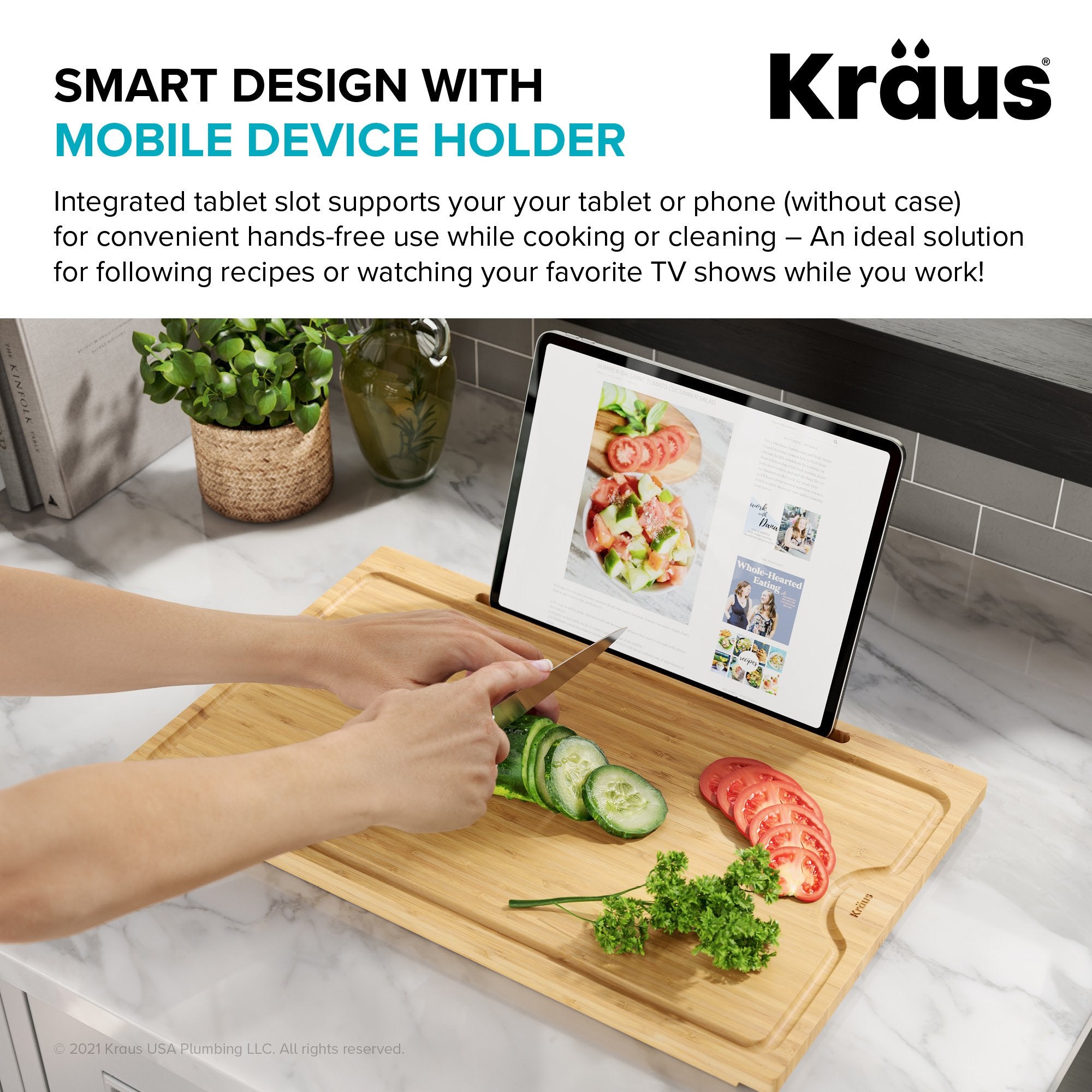 https://directsinks.com/cdn/shop/products/KRAUS-Solid-Bamboo-Cutting-Board-with-Mobile-Device-Holder-for-most-Standard-Kitchen-Sinks-KRAUS-DirectSinks-6_2000x2000.jpg?v=1654325485
