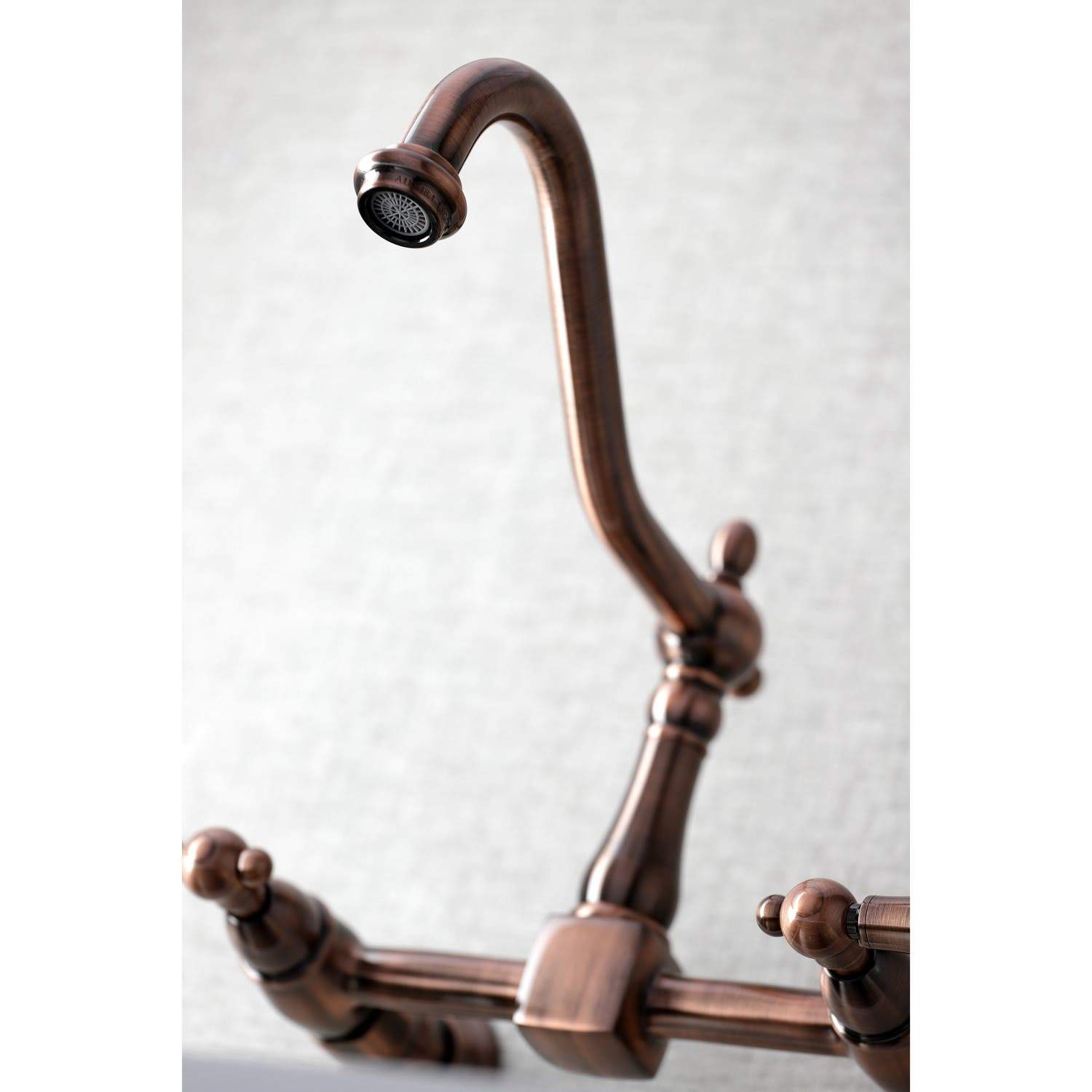 Kingston Brass KS124PLAC Heritage Two-Handle Wall Mount Bridge Kitchen Faucet, Antique Copper