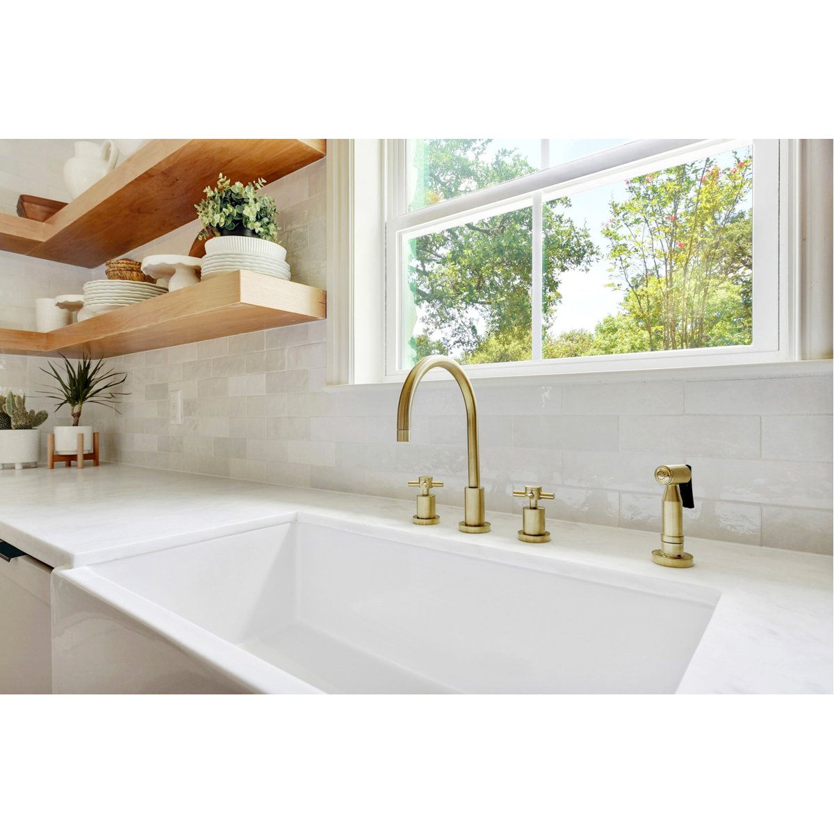 Kingston Brass Concord Deck Mount 8-Inch Widespread Kitchen Faucet with Brass Sprayer